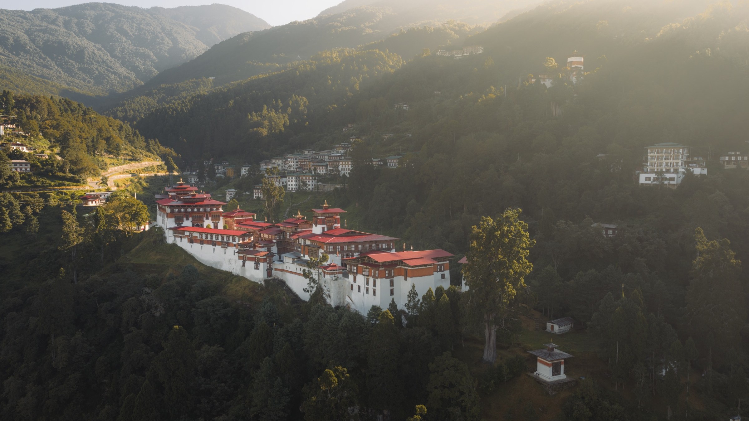 Trongsa Dzong along its ridge above the Mangde Chhu, in evening light