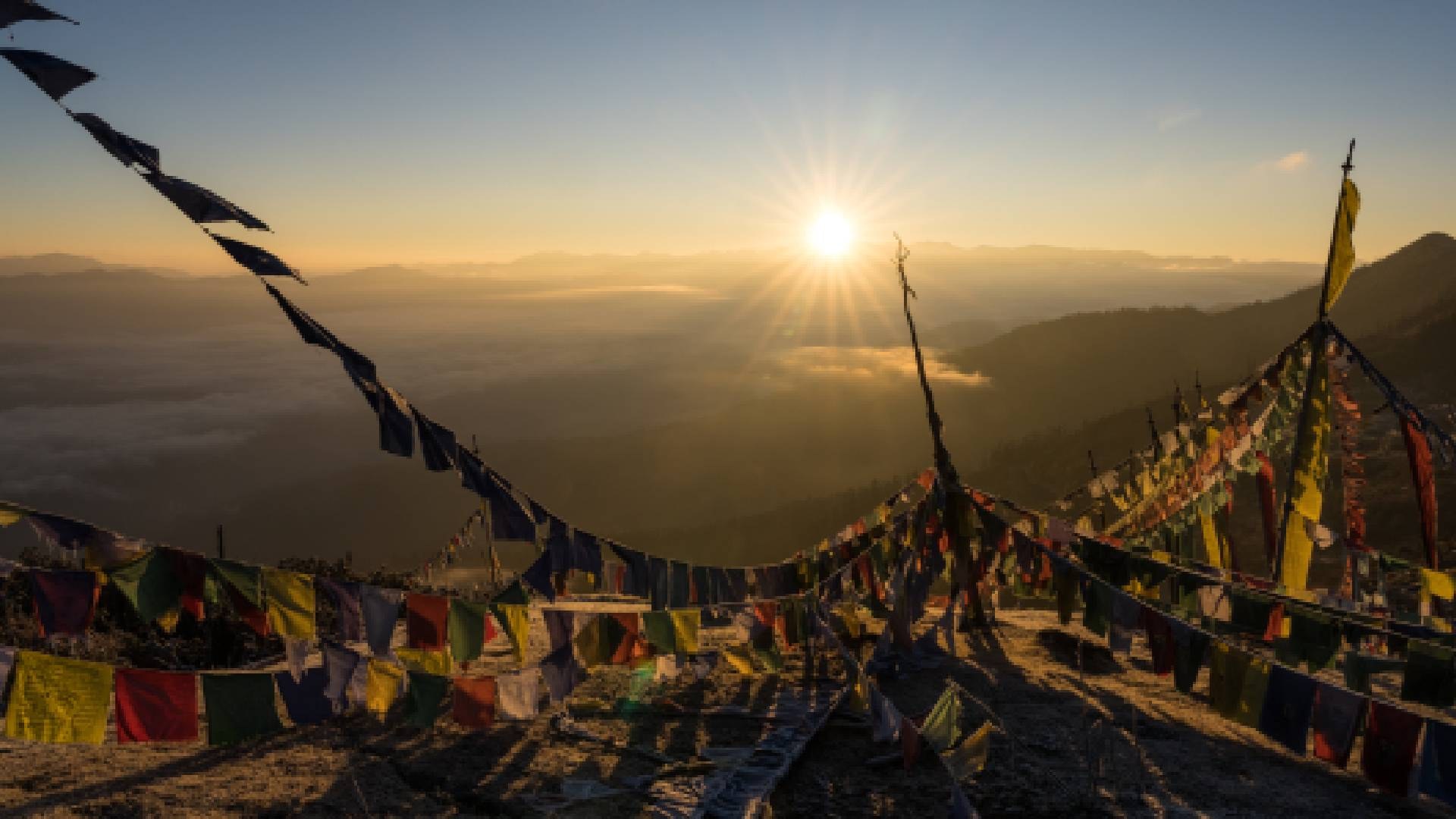 Prayer flags at sunrise